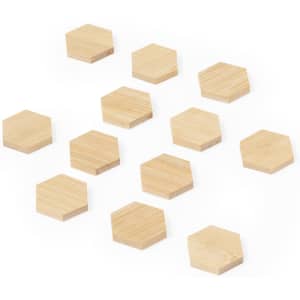 A set of twelve hexagonal bamboo magnets in natural colour arranged on a white background.