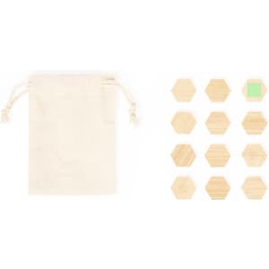 A canvas pouch alongside a set of twelve wooden hexagonal magnets in various natural finishes.