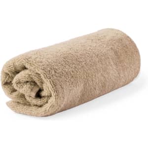 A rolled beige hand towel with a soft texture. The towel has a simple design and features a logo.