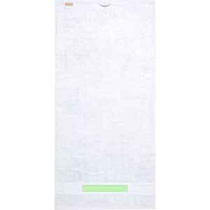 A white bath towel with a textured finish and a logo at the top. It features a green accent at the bottom.