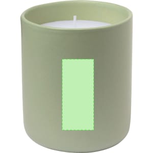A green ceramic candle holder with a white candle inside, featuring a logo on the side.
