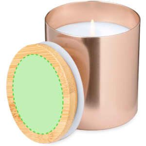 A rose gold aromatic candle with a white wax interior and a bamboo lid, featuring a green decorative label.