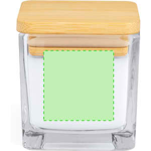 A glass candle jar with a bamboo lid, featuring a plain green label on the front.