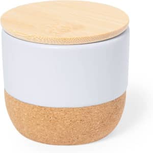 A Lavolia Aromatic Candle in a two-tone design, featuring a white upper section and a cork lower section, topped with a bamboo lid.