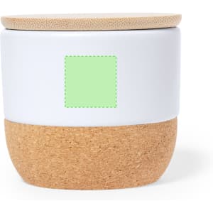 A white and cork aromatic candle with a wooden lid, featuring a blank green label on the front.