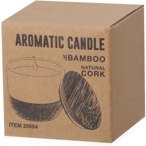 Aromatic candle in a bamboo container with a natural cork lid, displayed in a kraft cardboard box.