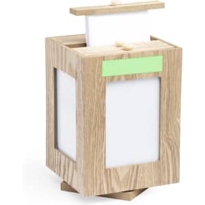 A wooden photo frame in a cube shape with white panels, featuring a removable top for easy photo access.