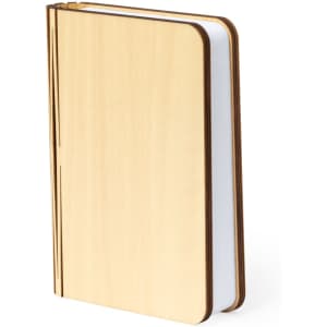 A wooden notebook with a smooth beige cover and white pages, featuring a simple design. It has a branding logo.