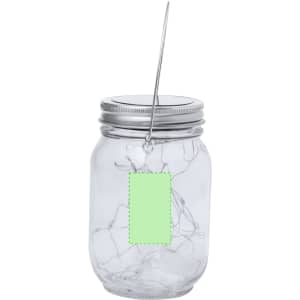 A clear glass jar with a silver lid and a metal hanger, featuring a blank green tag attached.