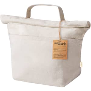 A cream-coloured cooler bag made of recycled cotton, featuring a fold-over top and sturdy handles.