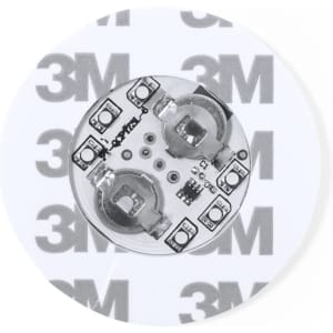 A round drink coaster in white with a 3M logo, featuring a black circuit board design in the centre.