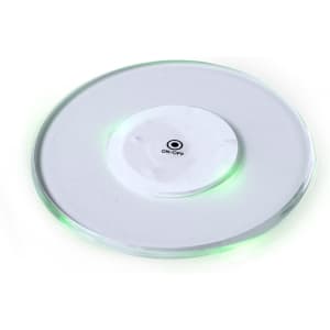 A rounded glass coaster with a white centre and green LED light around the edge, featuring an on/off logo.