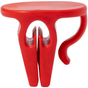 A red cup holder clip designed to secure drink containers, featuring a simple two-prong design with a hook.