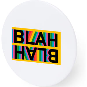 A round button badge featuring a colourful design with the word "BLAH" in bold black letters on a white background.