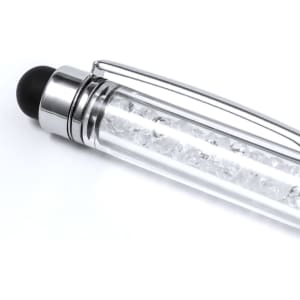 A stylus touch ball pen featuring a clear barrel filled with clear crystals and a black rubber tip, along with a silver clip.