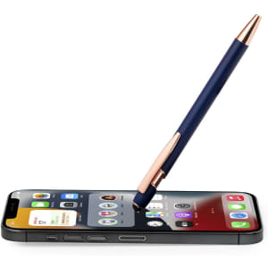 A navy blue stylus touch ball pen with a rose gold clip positioned above a smartphone screen.
