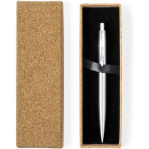 A metal pen with a sleek silver finish, nestled in a cork box with a black interior.