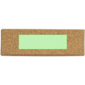A cork desk mat with a rectangular green accent in the centre, featuring a textured surface.
