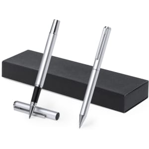 A metallic pen set in silver, displayed alongside a sleek black gift box. The set includes a pen and a mechanical pencil.