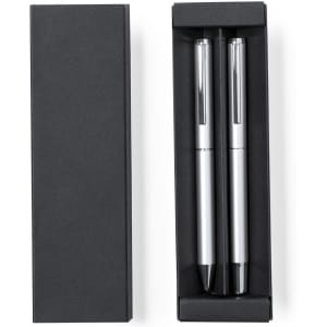 A metal pen set in a black box, featuring two silver pens with black accents. The box is simple and elegant.