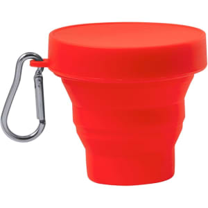 A foldable cup in bright red, featuring a carabiner for easy attachment, with a smooth surface and a round lid.