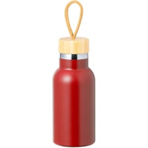 A drink bottle in a deep red colour with a bamboo lid and a cord handle. The bottle has a sleek design and a logo.