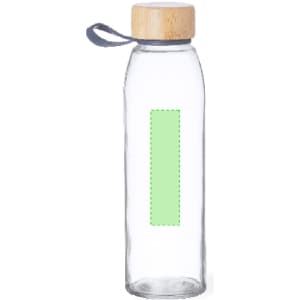 A drink bottle made of clear glass with a wooden lid and a grey strap, featuring a blank green label area.