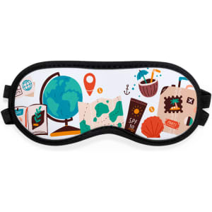 A travel eye mask featuring a colourful design with globes, maps, and various travel-related illustrations.