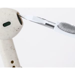 A white cleaning pen designed for delicate items, featuring a brush and a fine tip for precision cleaning.