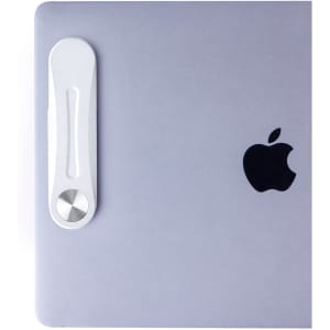 A silver and white phone holder with a sleek design, featuring a circular clasp and a logo.