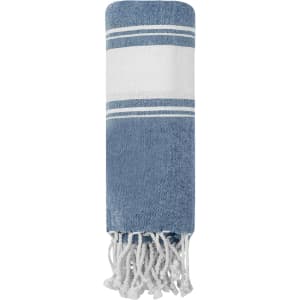 A blue and white striped towel pareo with fringed edges and a logo. Suitable for leisure and outdoor activities.