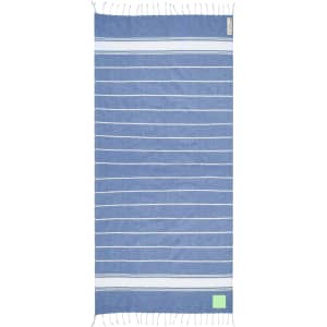 A blue and white striped towel pareo with fringe edges and a small logo tag.