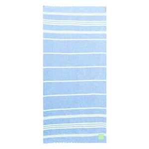 A blue and white striped towel with fringed edges and a small logo in one corner.