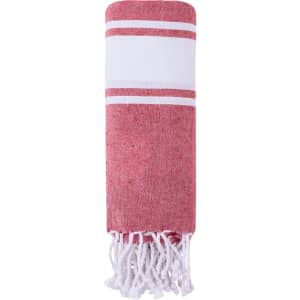 A red and white drawstring bag with decorative stripes and tassels at the bottom, featuring a logo.