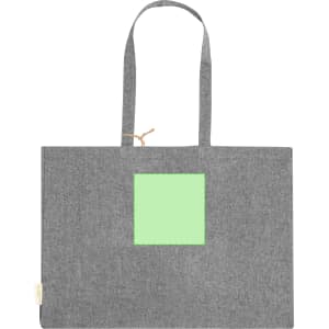 A grey tote bag with two handles and a blank green square on the front. It features a branding logo.