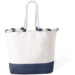 A tote bag in cream with a navy blue bottom, featuring rope handles and a simple design.
