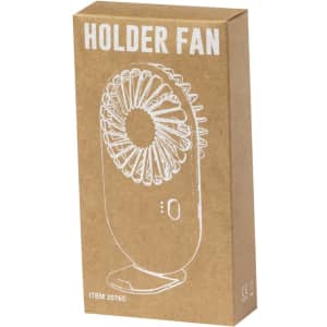 A cardboard box containing a small handheld fan, featuring a circular design and a simple stand. The box has a logo.