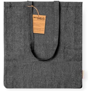 A dark grey tote bag made from recycled cotton, featuring sturdy handles and a tag attached.