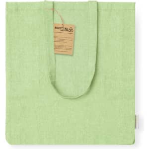 A green tote bag made of recycled cotton, featuring handles and a small tag attached.