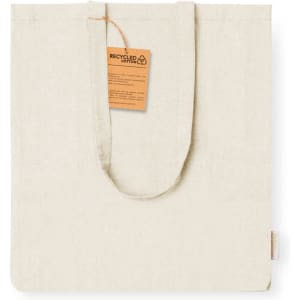 A beige tote bag made of recycled cotton, featuring two handles and a hang tag.