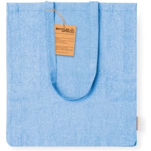 A blue tote bag made from recycled cotton, featuring handles and a tag.