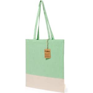 A tote bag featuring a mint green upper section and a cream lower section, with long straps and a tag attached.