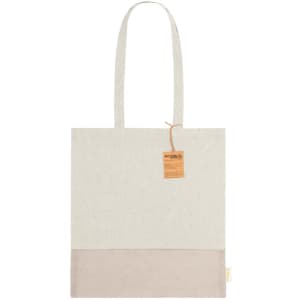 A tote bag in cream and light brown, featuring long handles and a branding label.