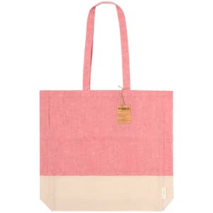 A tote bag in pink and cream with two long handles and a visible branding tag.