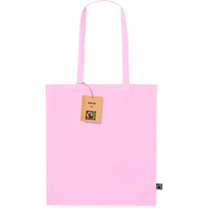 A pink tote bag with two handles and a tag, featuring a logo. It is designed for Fairtrade products.