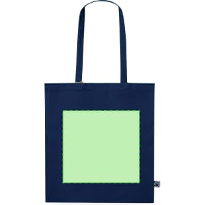 A navy tote bag featuring a large green square design and one logo. It has two sturdy handles.