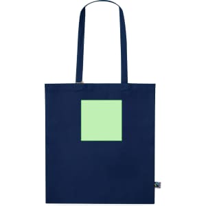 A navy tote bag featuring a light green square design and a small logo on the side.