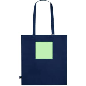 A navy tote bag with a square green section and long handles. The bag features a logo on the side.