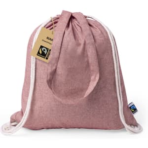 A pink drawstring bag with white straps, featuring a tag and a logo at the bottom.