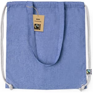 A blue Riak Fairtrade drawstring bag with a light grey drawstring and a fabric tag. It has a logo on the bottom corner.
